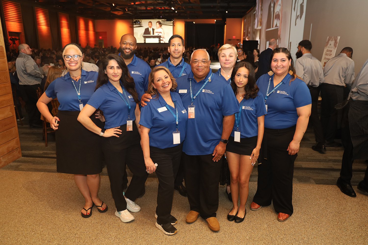 group of individuals smiling at camera
