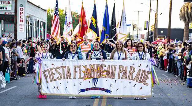 Photo of students enjoying the Fiesta Flambeau Night Parade